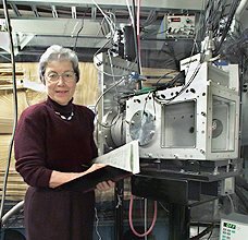 Darleane Hoffman with the instruments she uses to track down heavy elements.