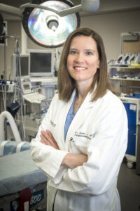 Jayme Locke in lab wearing lab coat