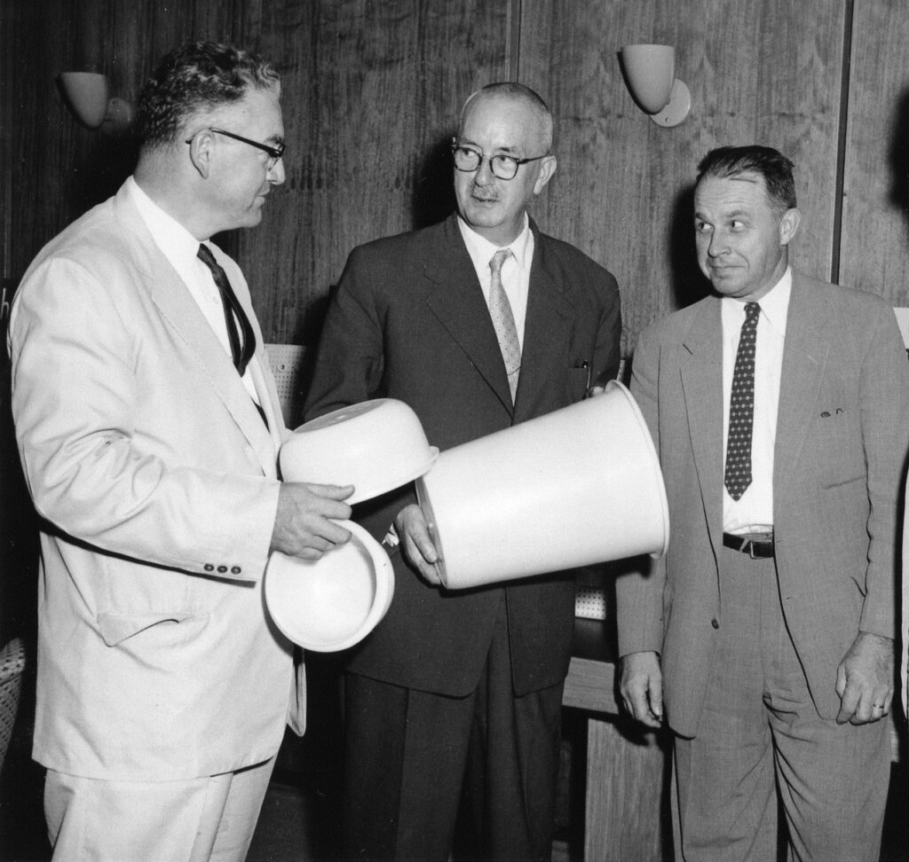 Karl Ziegler (center) with members of the Hercules group that commercialized high-density polyethylene as Hi-fax.